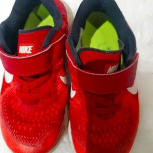 Size 10 red Nike shoes